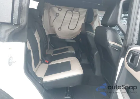 2023 Ford Bronco Wildtrak from USA, damaged, VIN 1FMEE5DP6PLB75580